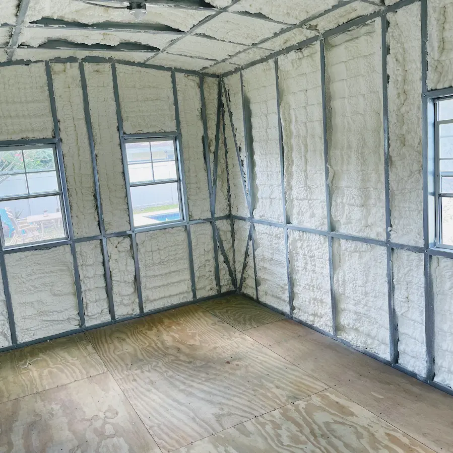 Closed-cell spray foam insulation applied to wall cavities in a residential project in Clanton